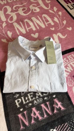 Men's light blue short sleeve button down shirt. SizeXXL, New.