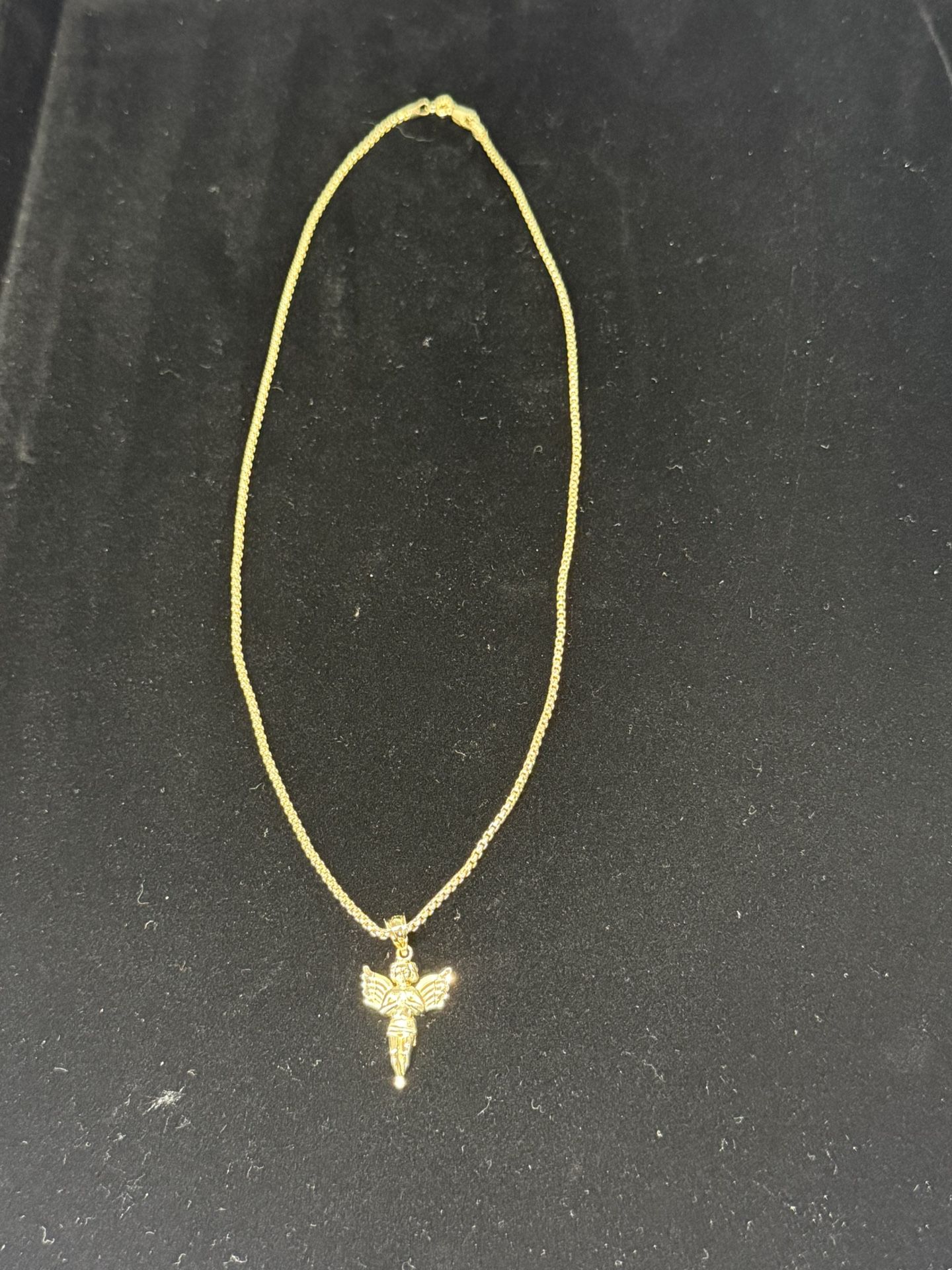 10k Yellow Gold 1.8mm Round Box Chain In 18inches With 10k Gold Angel Pendant.