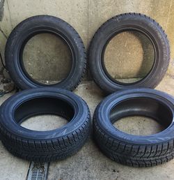 Set of four Bridgestone all season tires. Size is 205/55R16 91T