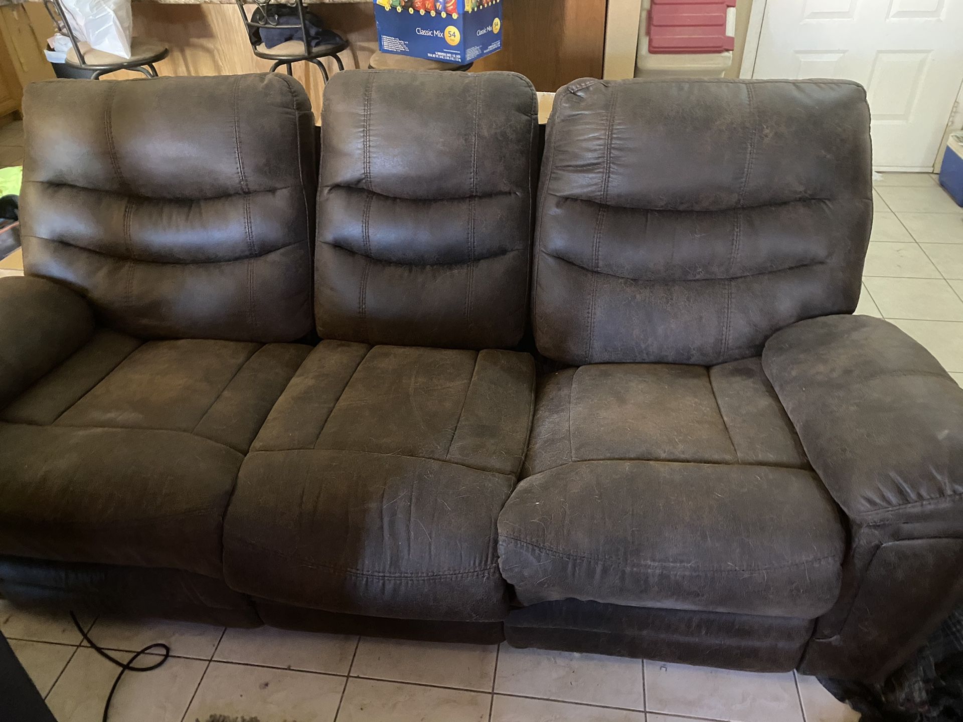 Free leather reclining couch.