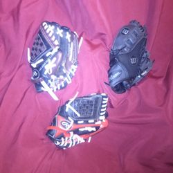 (3)...9" T-ball Gloves Including (2) "Rawlings" And (1) "Wilson"
