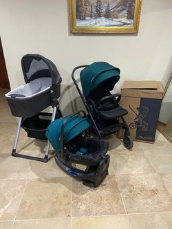 2022 Nuna Mixx Next Stroller With Car Seat RX With Green Canopy And Bassinet With Stand