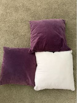 3 Throw pillows in line new condition for. $6.00