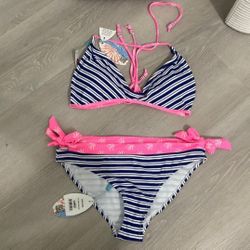 Beautiful brand new bikini! Size large.