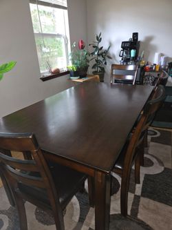 Dining room table with 4 chairs & bench
