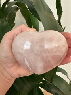 New, beautiful Rose Quartz Crystal Puffy Heart. Display stand included. Shipping available.