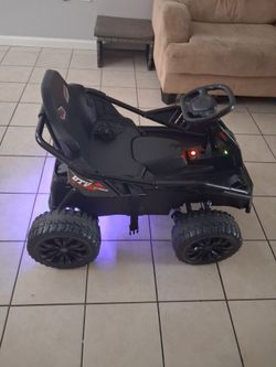Garvee 24V Kids Power Ride-On UTV, an electric off-road toy car