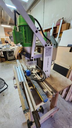 Hinge boring machine.  Semi auto.  Italy made