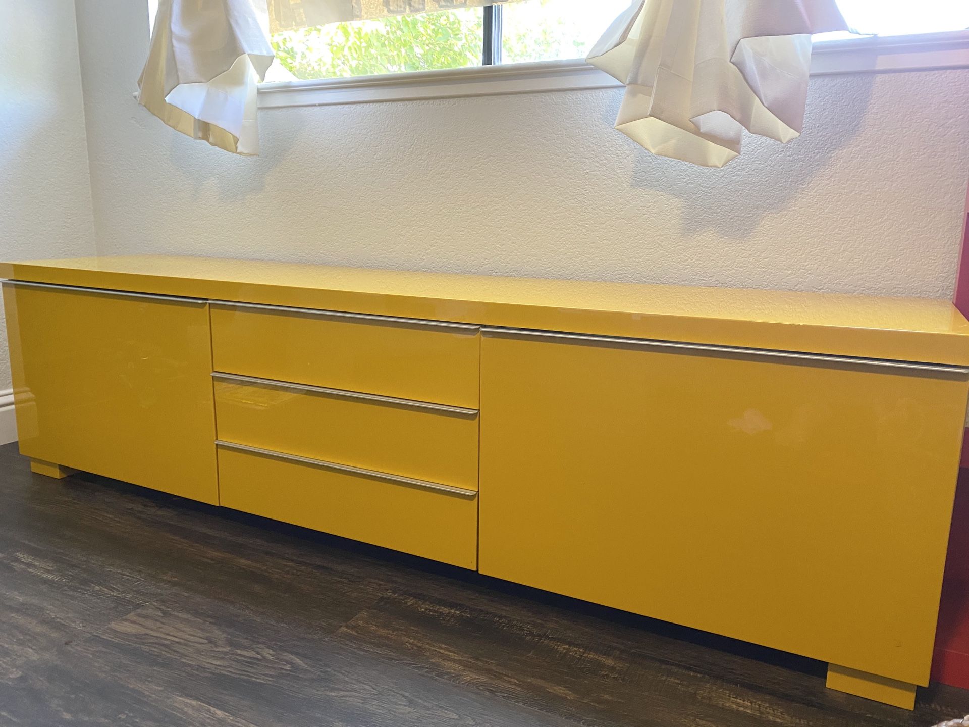 Yellow IKEA media cabinet