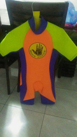 X's or Small size wet suit