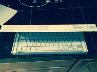 Apple wireless keyboard still in box with cellophane wrap never been used