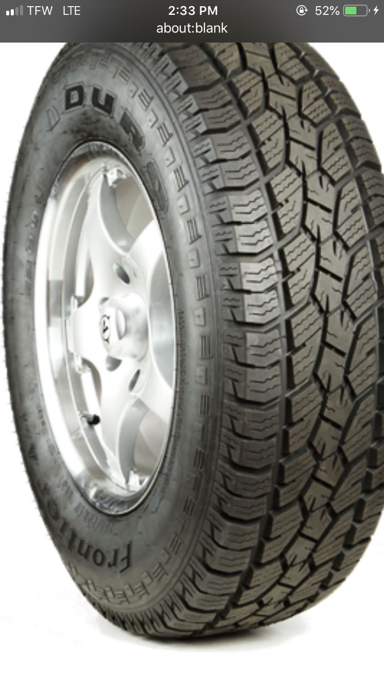 Tires all different sizes and different brands