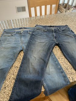 Two adult pair of Hollister jeans 32*30 slim straight cut