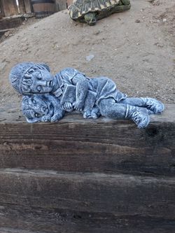 Concrete statue for garden decoration