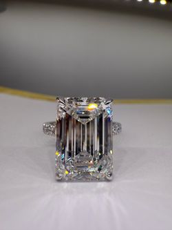 8.21 carat f vvs2 emerald cut lab diamond on a pave band