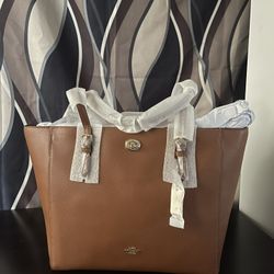 Coach Tote/ Saddle color/ Coach Retail Store