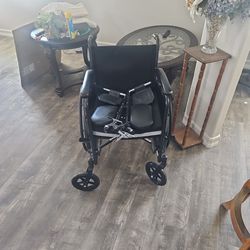 Midline Wheel Chair With Foot Pedals