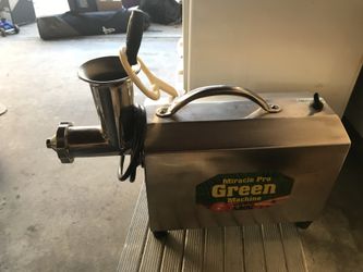 Green sprouts and other healthy veggies squeezer