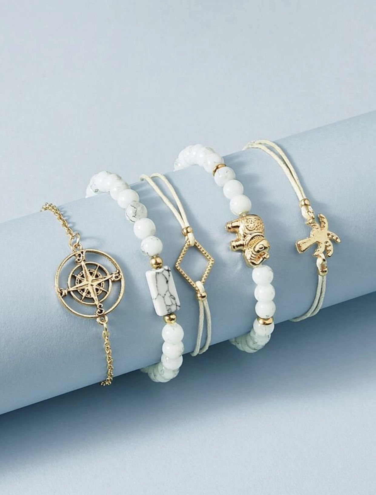 Gorgeous NEW 5 piece compass, elephant and palm tree bracelet set
