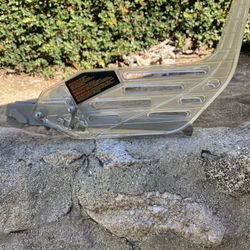 Dewalt table saw blade guard assembly. It is an original part designed for several Dewalt table saw models, including the DW745, DW744XRS, DW744X, and