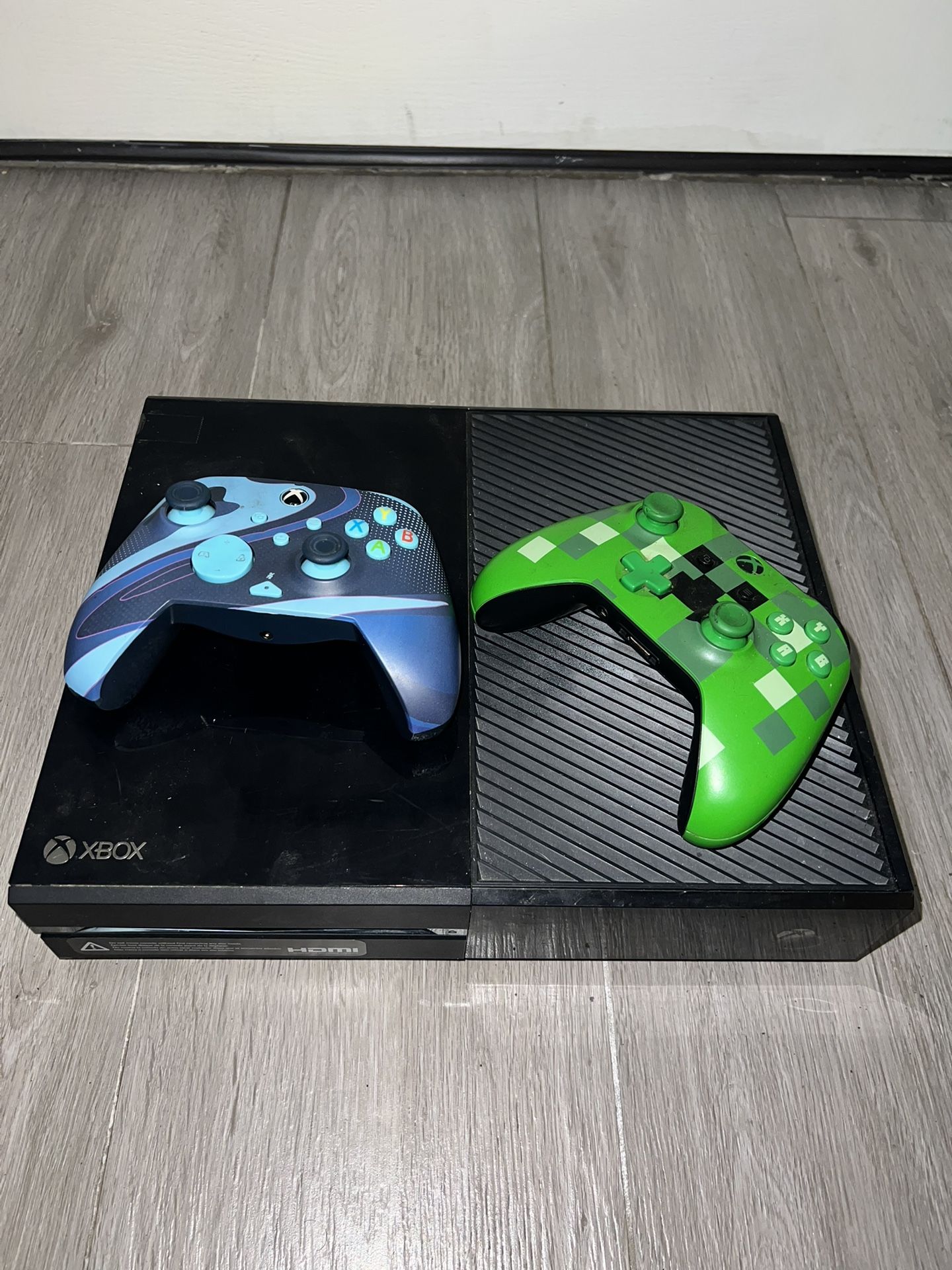 Xbox One + 2 Controllers + Roku TV - Entertainment Bundle