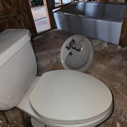 Gray Tub, Sink, Toilet 