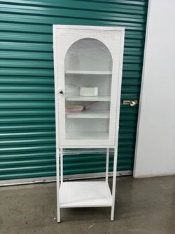 like-new white metal accent cabinet with glass door