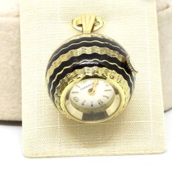 Vintage Caravelle ball clock , mechanical , in gold-colored, dark blue