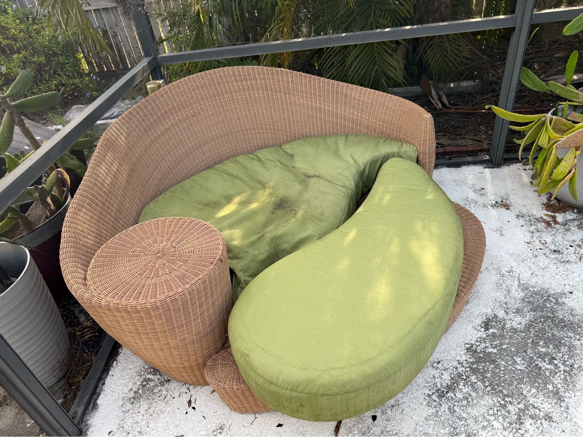 Large wicker outdoor lounger