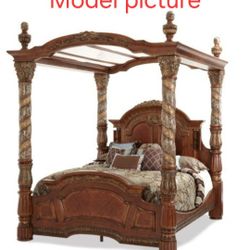 Beautiful California King bed with posts and canopy, no mattress or box spring.