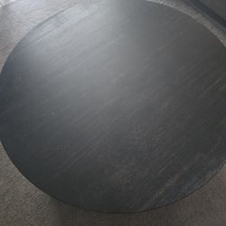 Black Round Table And Entertainment Shelf