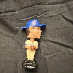 A. Rodriguez Rangers bobblehead and Mickey Mantle anniversay ball