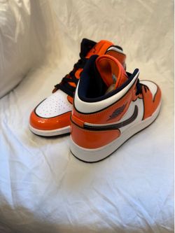 Women’s Size 7/ Kids size 5.5Y Air Jordan 1Mid SE GS.  Turf Orange/ black white. NWB