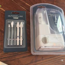 INTERPLAK  Conair Compact Countertop Water Flosser With 5 Tips