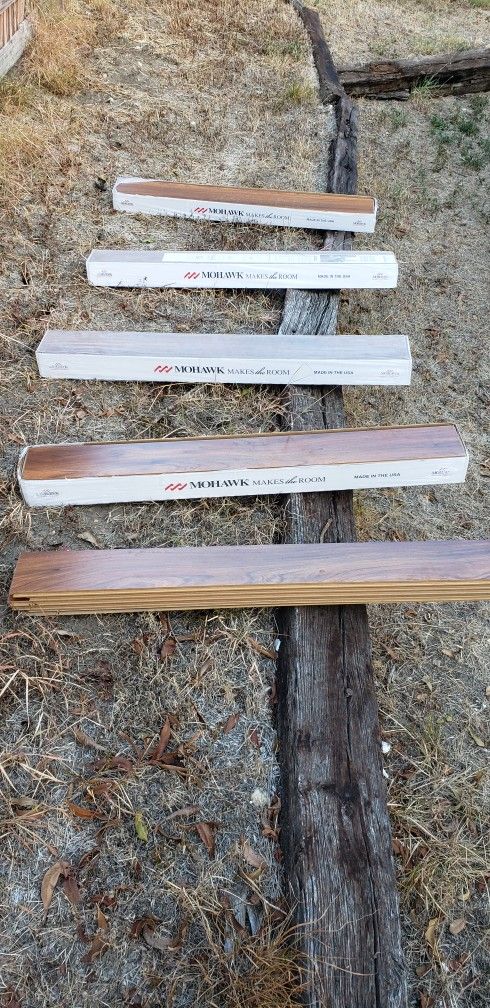 4. 3/4 Boxes Of Mohawk Flooring