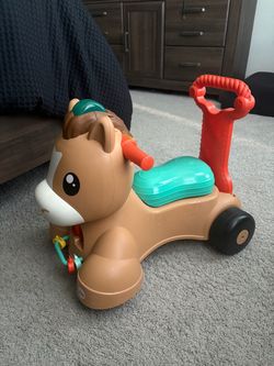 Fisher-Price Bounce and Ride-On Pony Toy