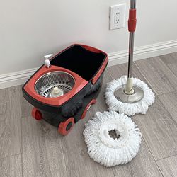 $25 (Brand New) Deluxe black spin mop wheels and extended handle with 2x microfiber mop heads 