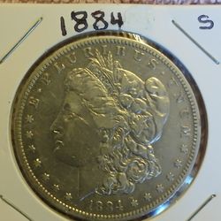 1884 S MORGAN DOLLAR. 