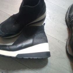 Michael Michael Kors Skyler sock wedge sneakers in black. 