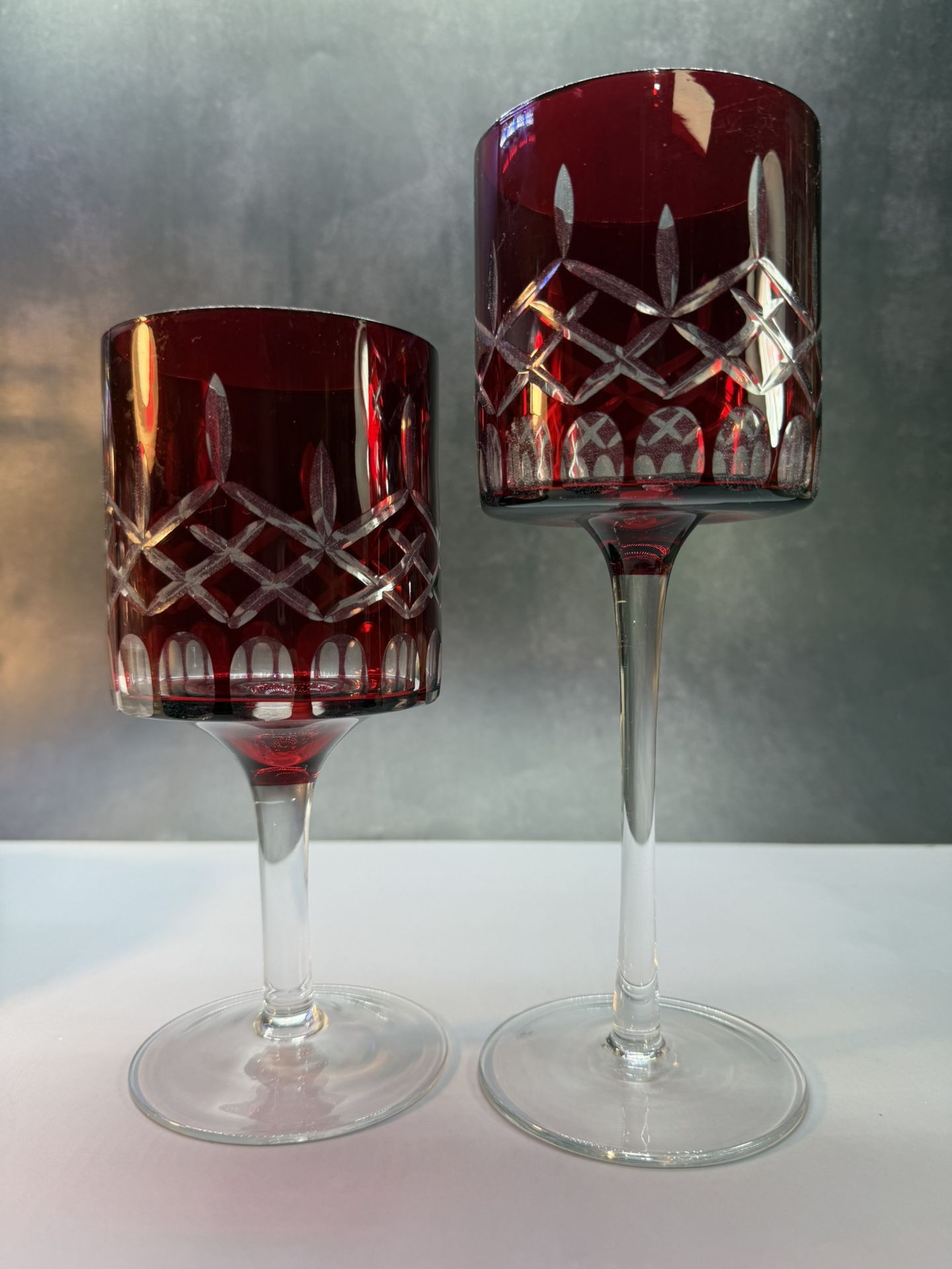 Set of beautiful rare tall/large Bohemian Crystal Red cut to Clear candle holders. Votive to short pillared candles.
