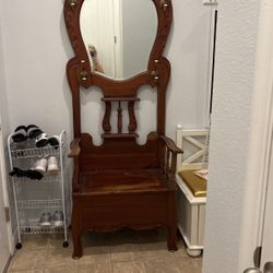 Antique chair with extra space to store for hooks and mirror