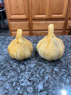 Ceramic Vintage Large Ceramic Garlic Clove Pair of Salt and Pepper Shakers.  Preowned.  Has been on display in a cabinet with a very large salt and pe