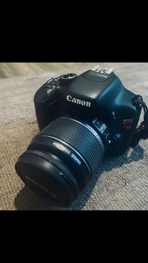 Canon EOS Rebel T2i camera with EF-S 18-55mm f/3.5 - 5.6 IS lens.