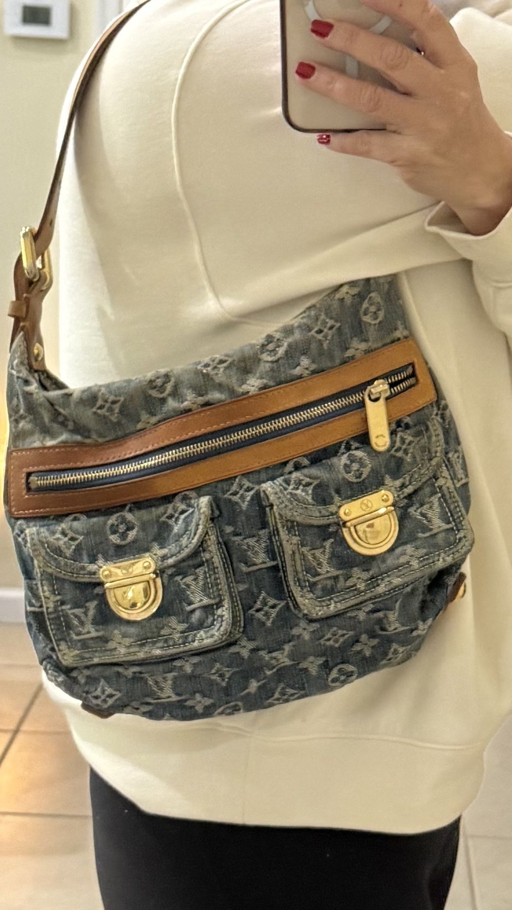 Authentic Louis Vuitton Monogram Denim Baggy PM Shoulder Bag.