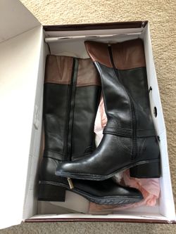 Brand new boots. Never worn. Still in box. Size 7.5