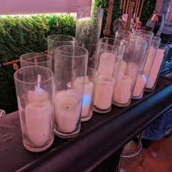 Tall Candles In Glass Cylinders