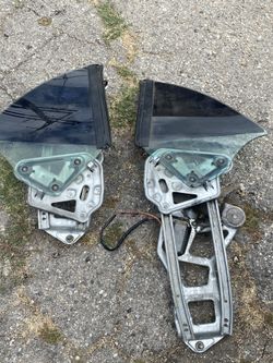 1999 -2004 mustang convertible rear quarter window.
