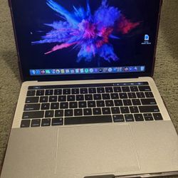 Apple - MacBook Pro laptop, with a touch bar  13 inch