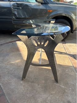 Glass topped custom metal table