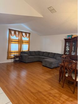 **Gray Sectional Sofa – Good Condition